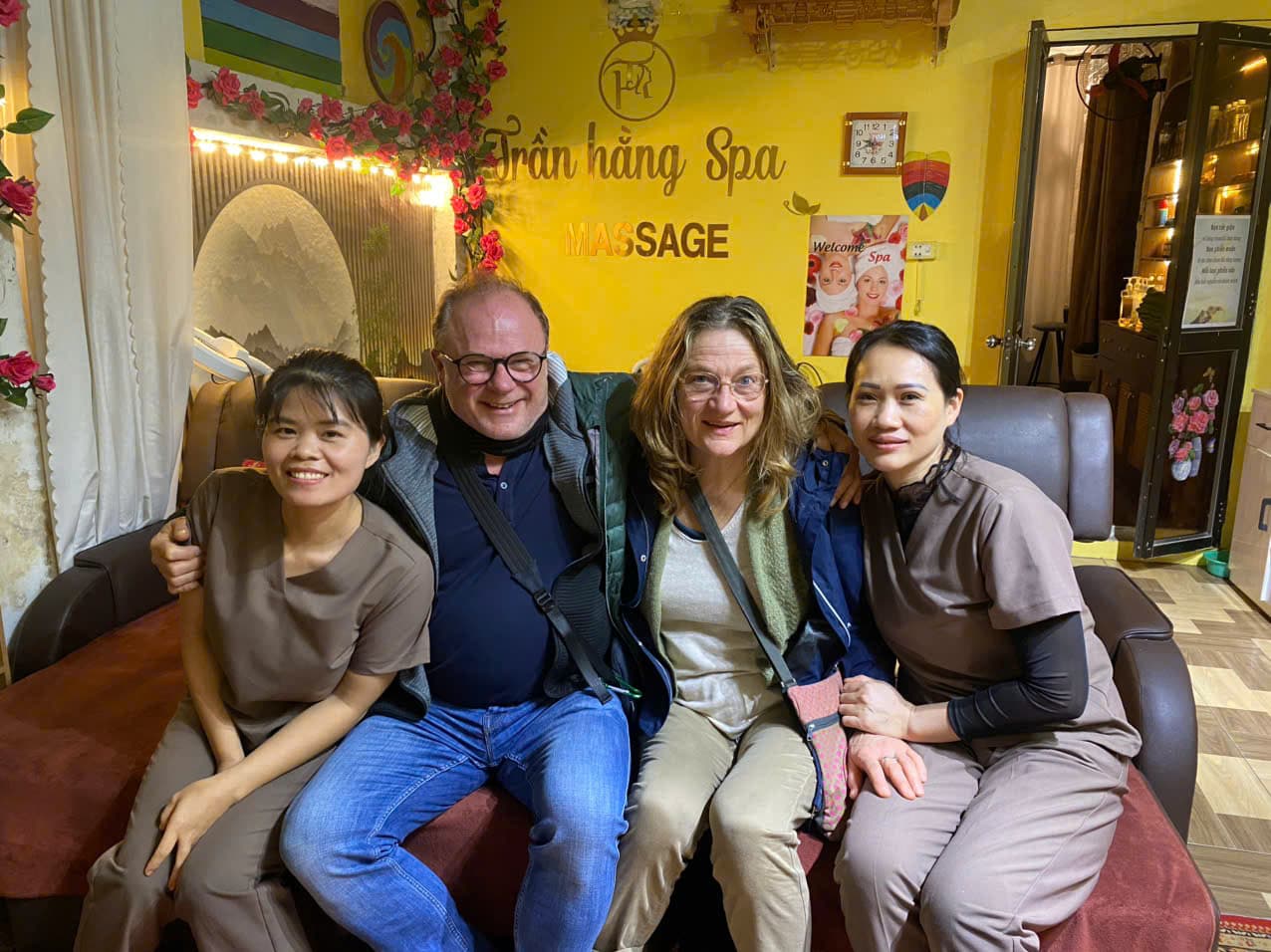 Happy guests with the Tran Hang Spa team